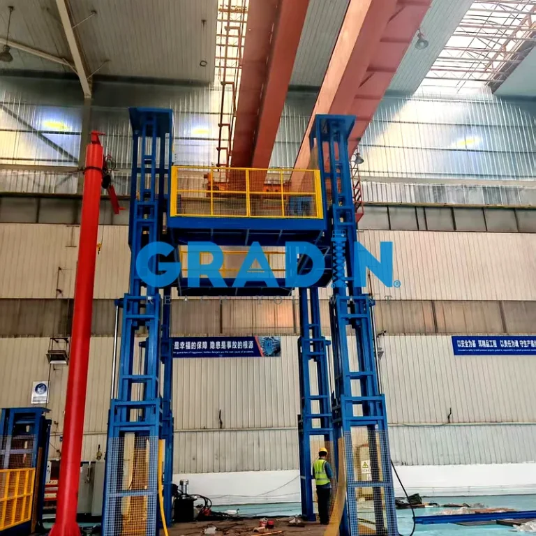 Heavy-duty 4-cylinder 4-post hydraulic assembly lift table with integrated safety guardrails for industrial manufacturing.